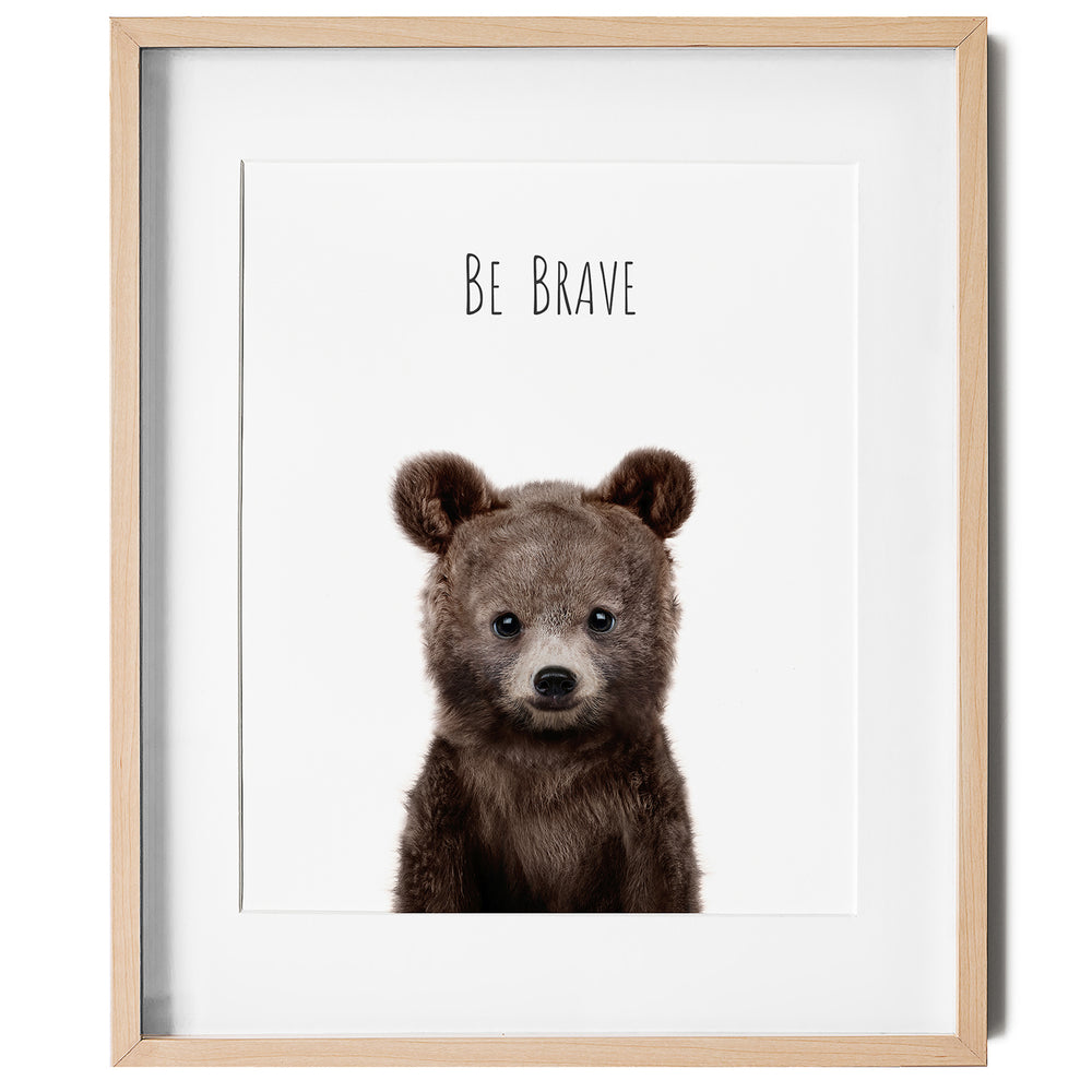 
                      
                        Nursery wall art of a baby bear with the words "Be Brave" in a nursery
                      
                    